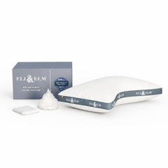 Eli & Elm vue avant de l'oreiller en U montrant l'enveloppe et la forme ergonomique adaptée aux épaules