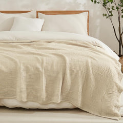 EMME couverture face pleine beige montrant drapé décoratif et confort