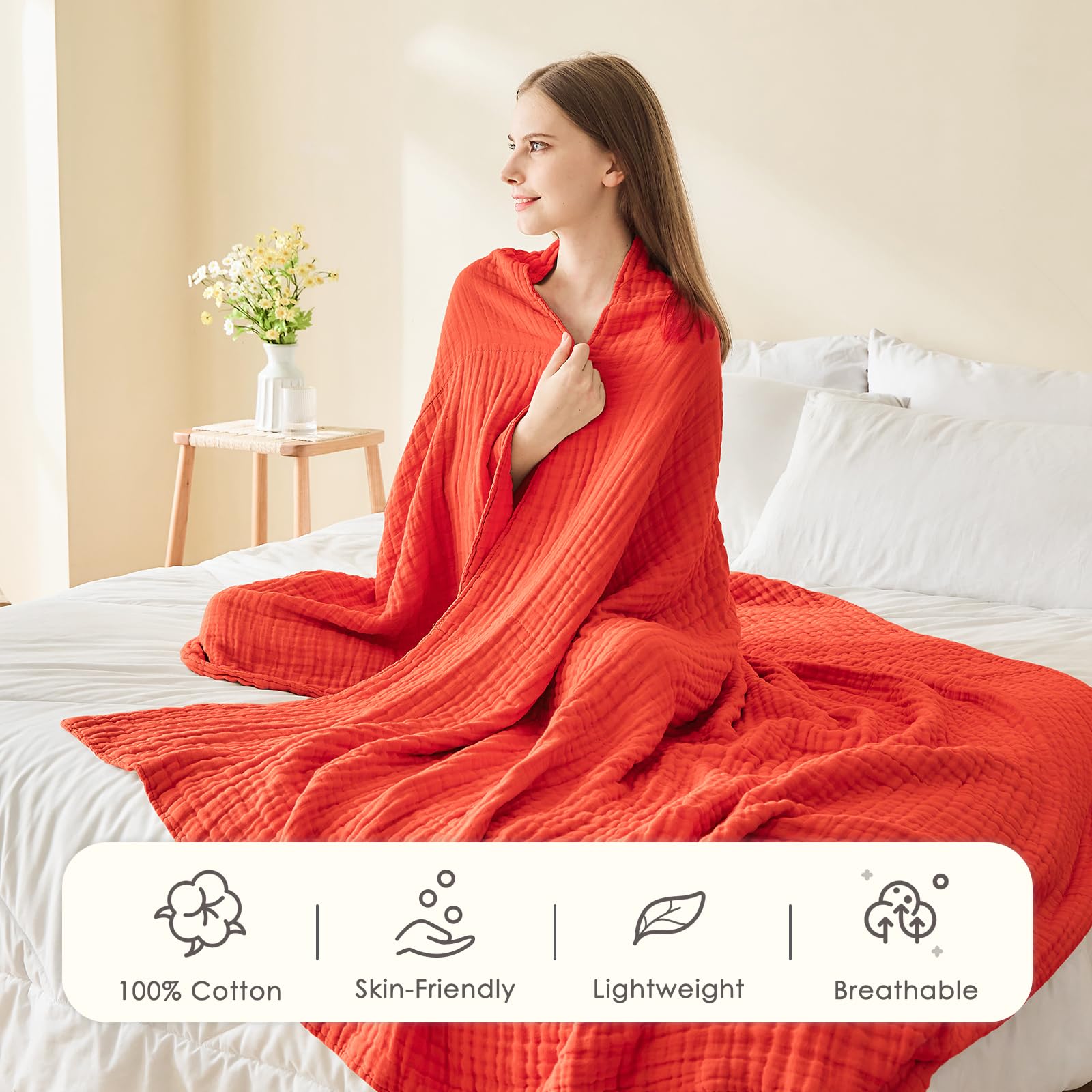 EMME plaid étalé sur canapé offrant confort cosy instantané