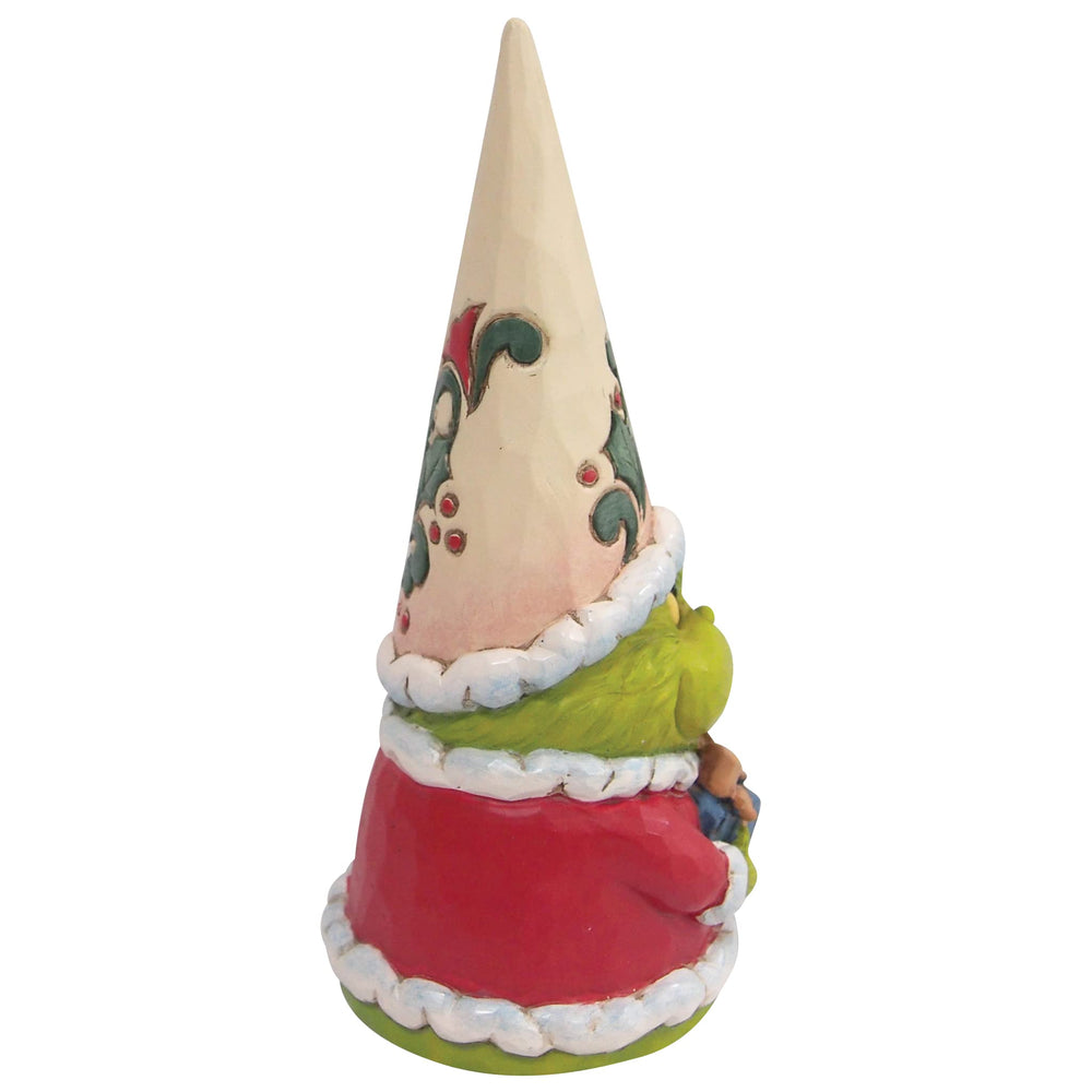 Enesco Jim Shore gnome Grinch gros plan sur le cadeau tenu, accent sur les motifs colorés