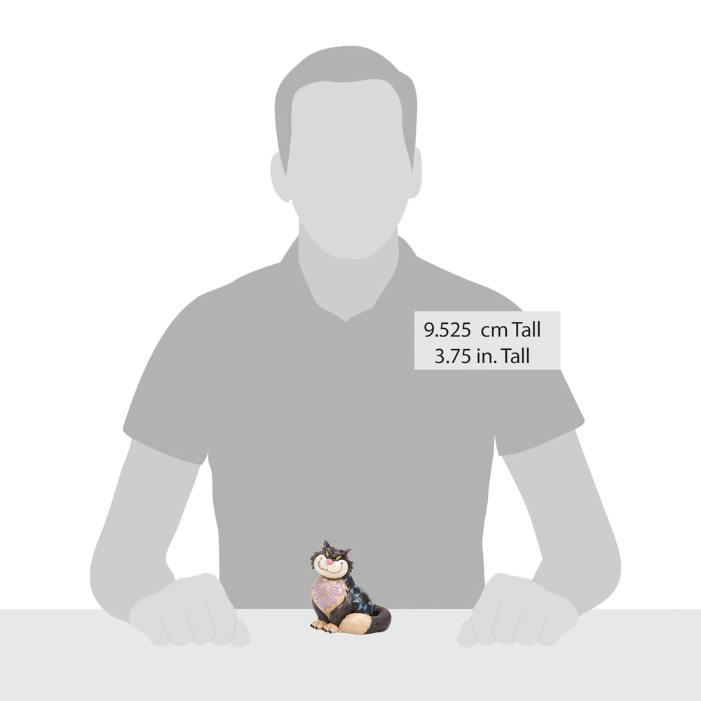 Enesco Lucifer comparaison d’échelle montrant la taille compacte