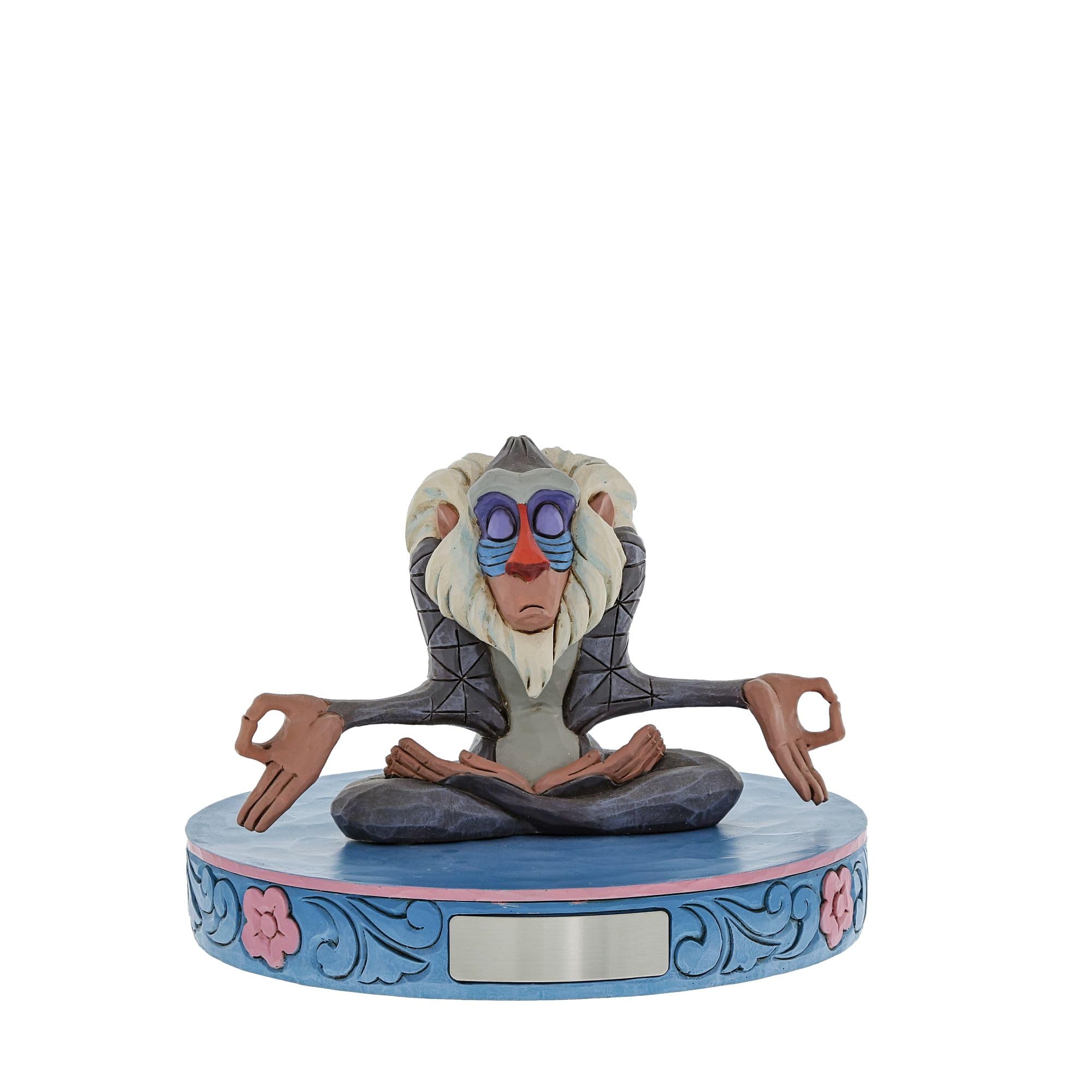 Enesco Rafiki posé sur une étagère ajoutant charme décoratif subtil