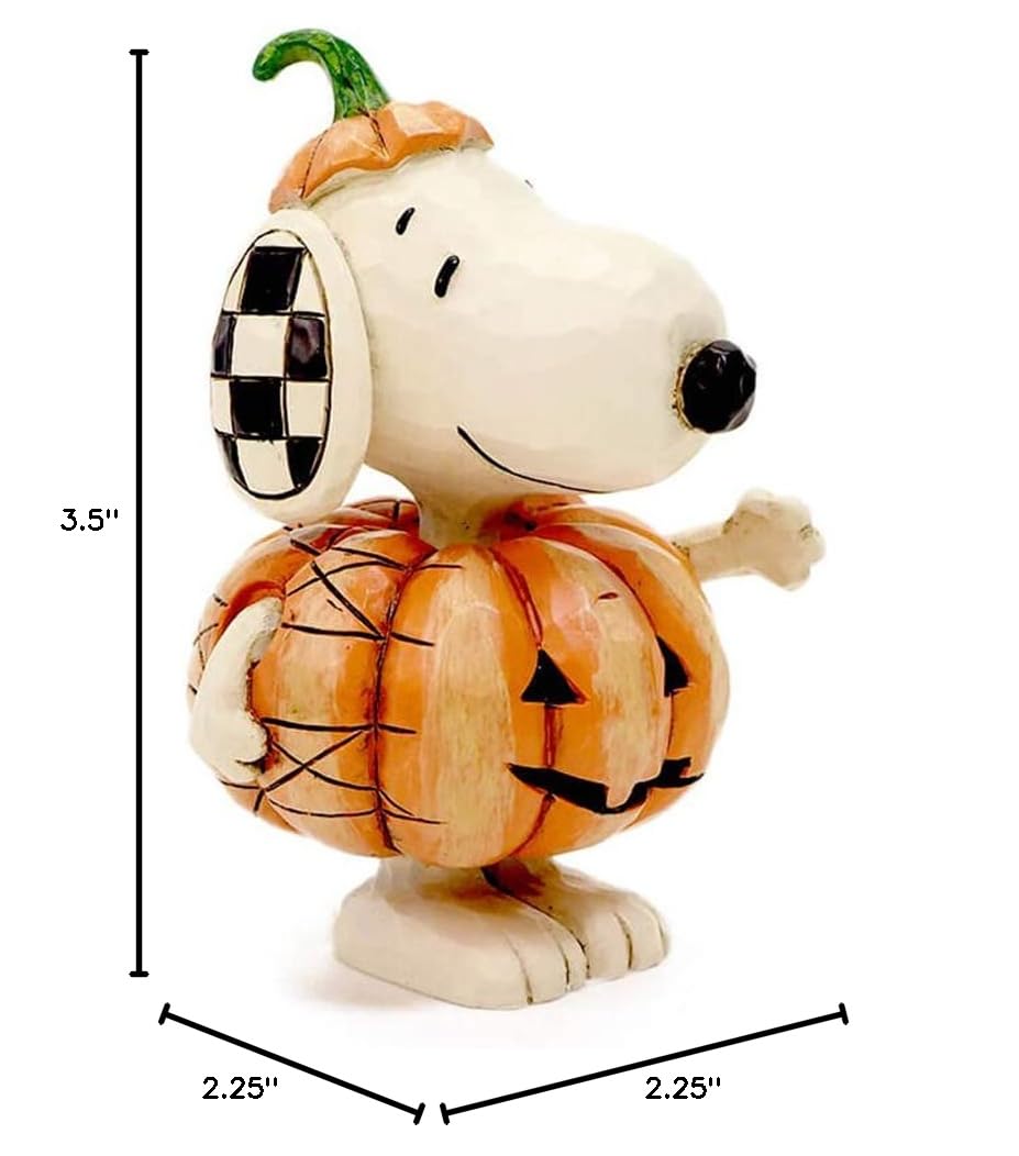 Enesco Snoopy présenté dans décor Halloween ajoutant une touche festive élégante