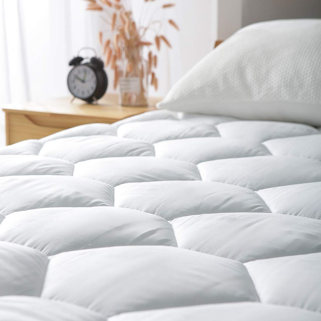 Favorland côté extensible enveloppant montrant maintien sûr sur matelas épais