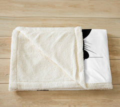 Feelyou plaid utilisé par un enfant sur canapé pour moments cocooning