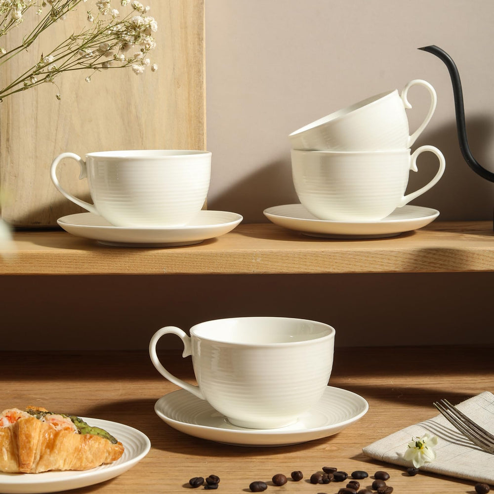 Feenmai tasse avec latte art, met en valeur les boissons crémeuses
