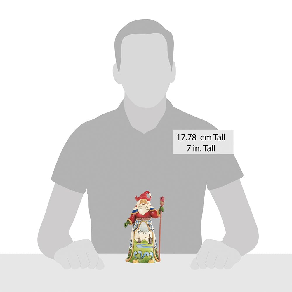 Enesco Jim Shore figurine tenue en main montre échelle et solidité