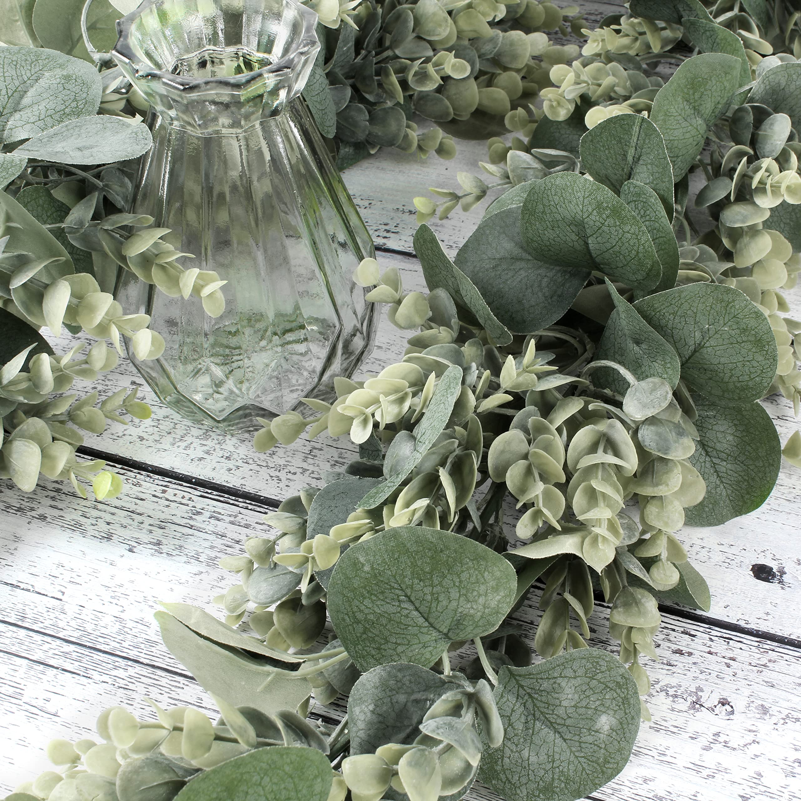 FLORLAB guirlande décorant une arche de mariage pour une ambiance naturelle