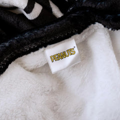 Franco Snoopy plaid utilisé sur canapé apportant chaleur instantanée