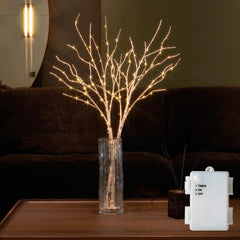 Fudios branches en vase montrant l'ensemble décoratif et l'effet chaleureux