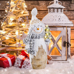 Galiyen bonhomme de neige profil montrant détails pommes de pin et finition