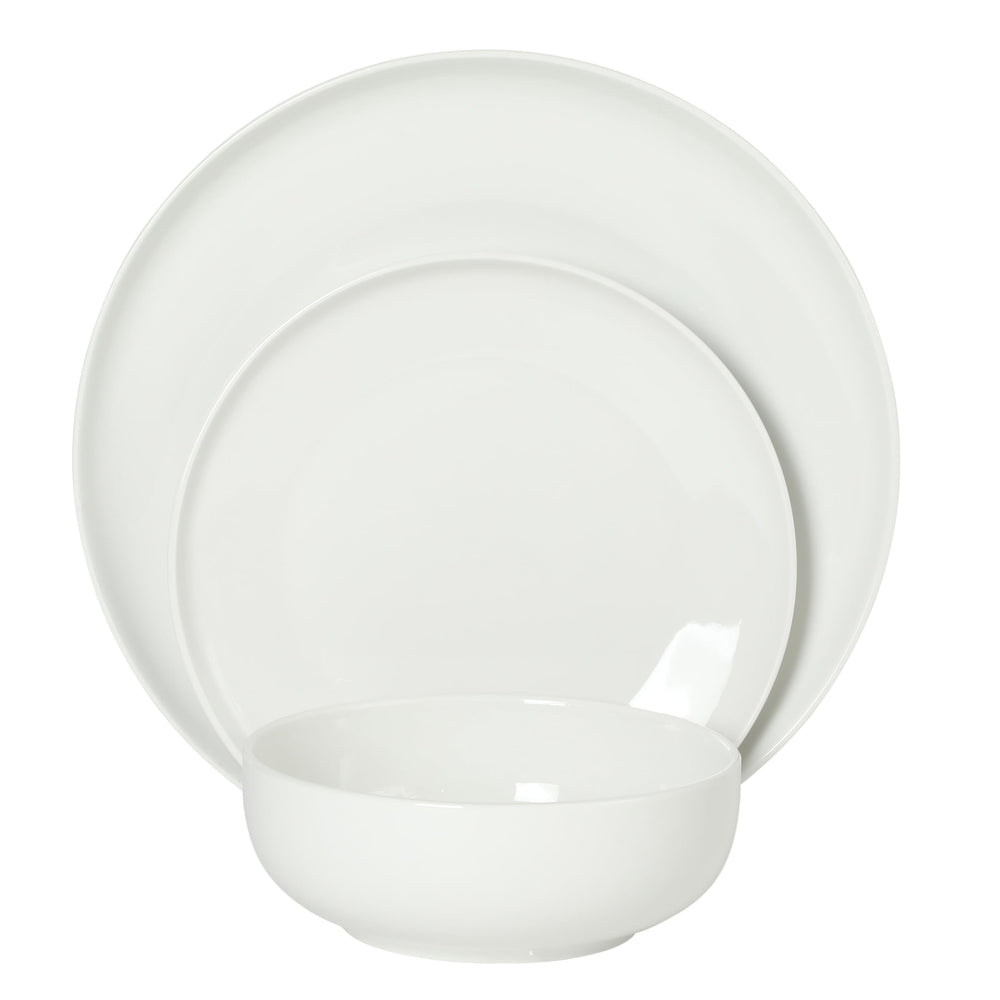 Gibson Home table minimaliste avec service blanc mettant en valeur les plats