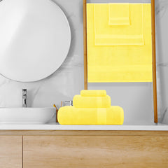GLAMBURG comparaison des tailles montrant serviette bain, main et gant pour échelle
