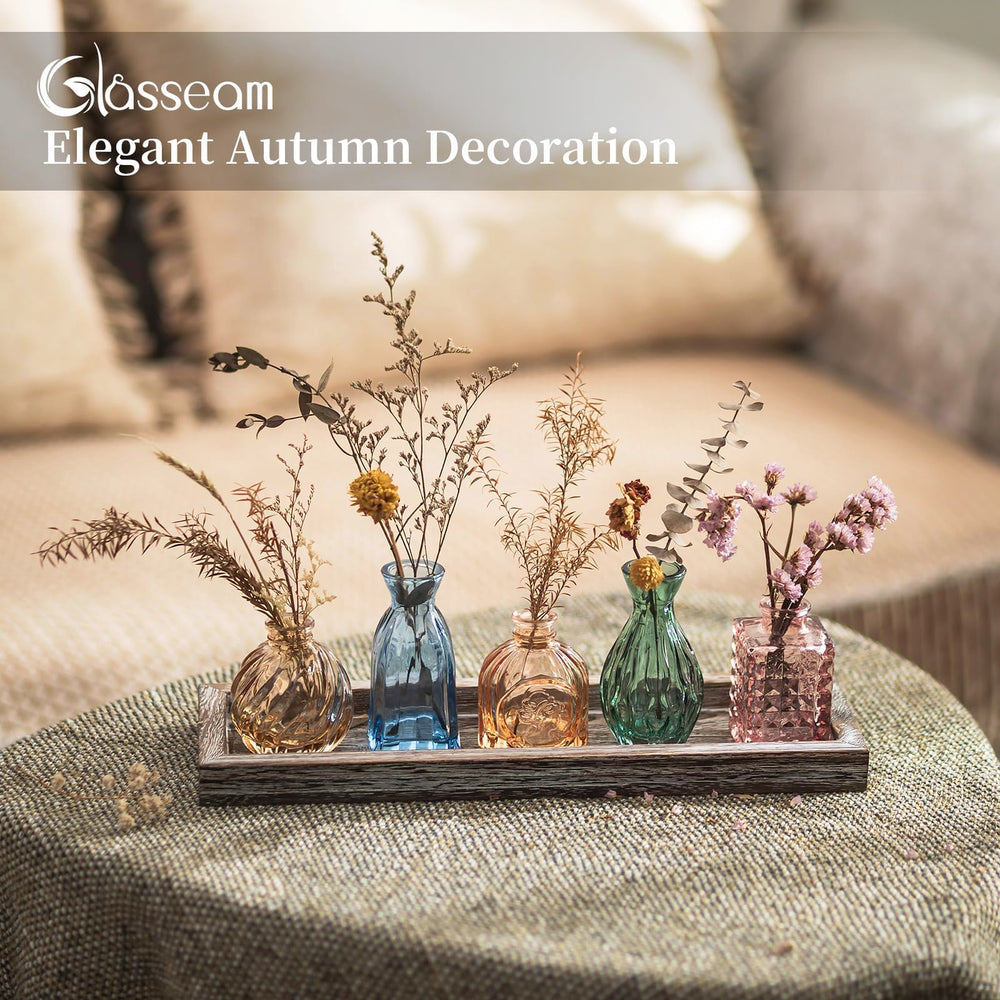 Glasseam composition saisonnière intégrant vases et petits objets décoratifs