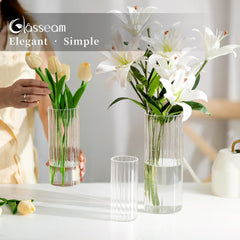 Glasseam vases avec bougies allumées créant ambiance chaleureuse
