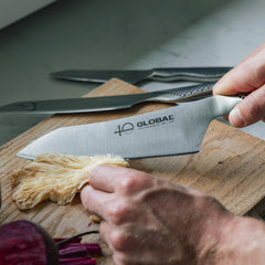 Global détail de la lame Asian Chef 7" montrant finition et résistance