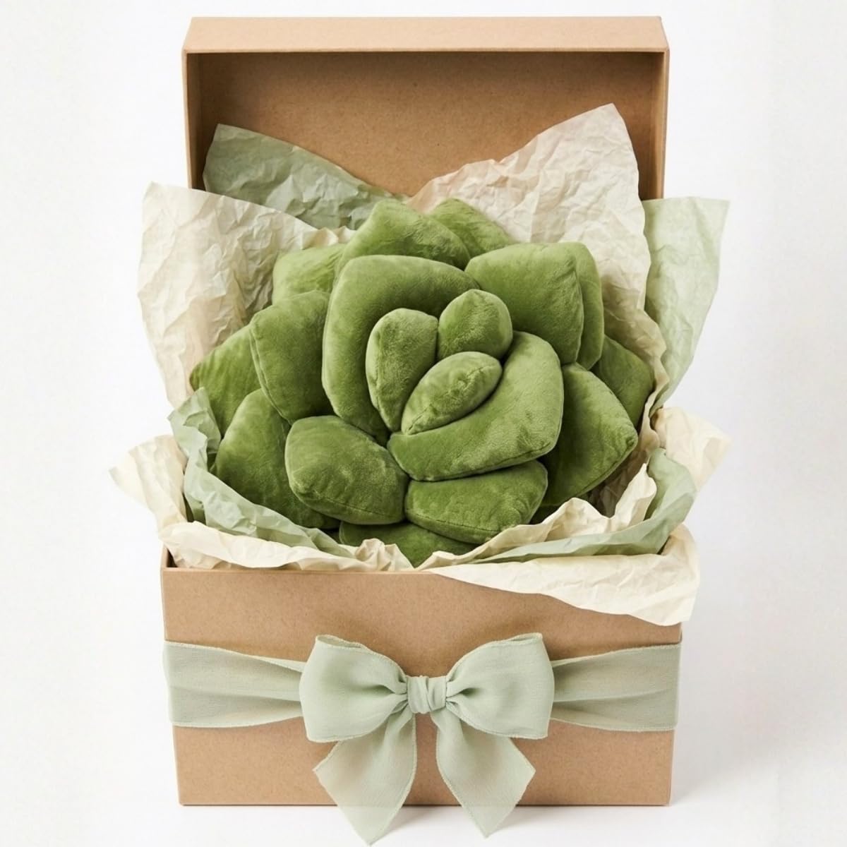 Green Philosophy Co. coussin dans une chambre stylée illustrant comment harmoniser une palette olive