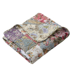 Greenland Home vue avant du jeté patchwork montrant les couleurs vives et ambiance jardin
