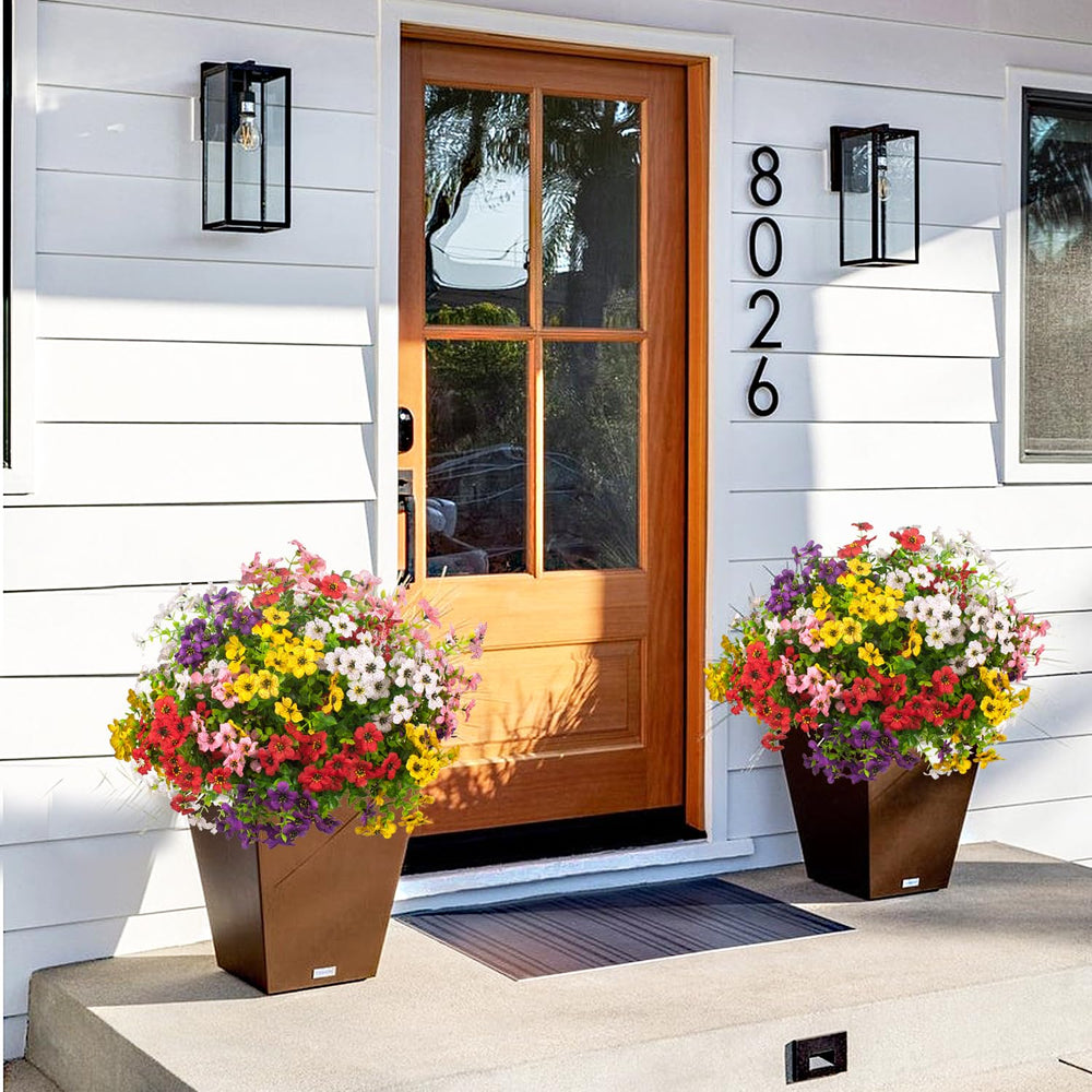 Grunyia fleurs artificielles installées sur balcon apportant couleur immédiate