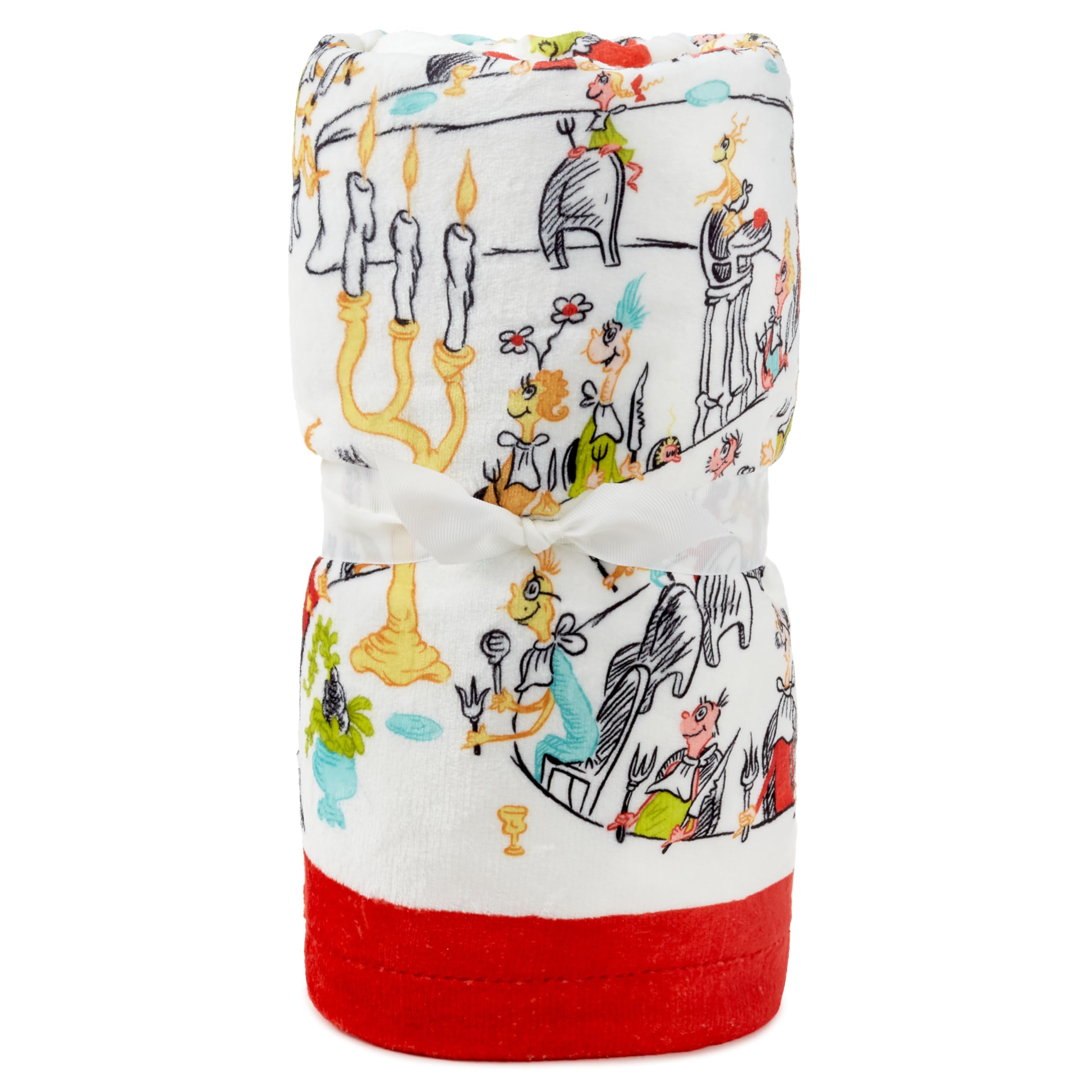 Hallmark couverture Grinch utilisée sur canapé, chaleur et style