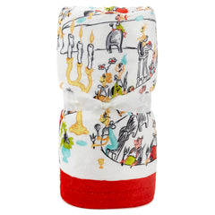 Hallmark couverture Grinch utilisée sur canapé, chaleur et style