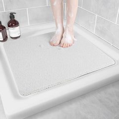Hargiis vue avant du tapis blanc 60×60 cm montrant l'emballage et dimensions, sécurité immédiate