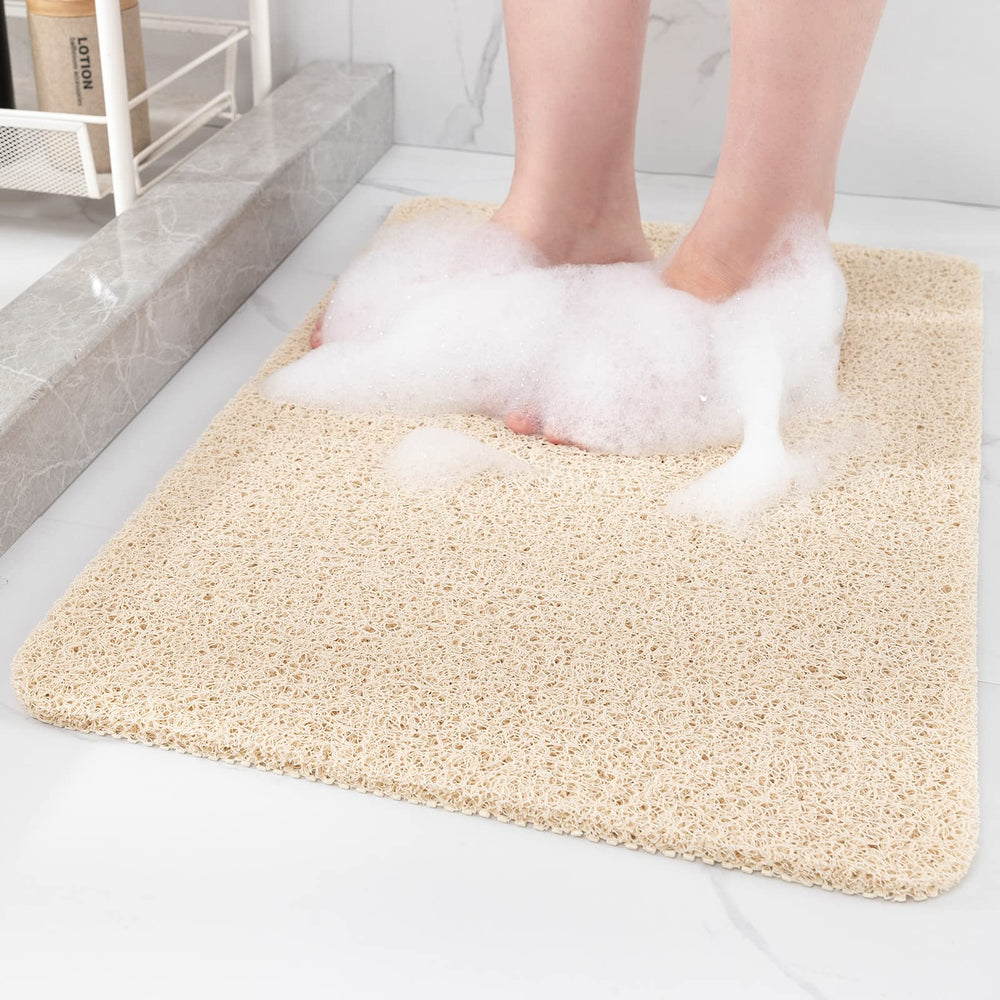 Hargiis tapis face avant montrant forme beige et sécurité antidérapante