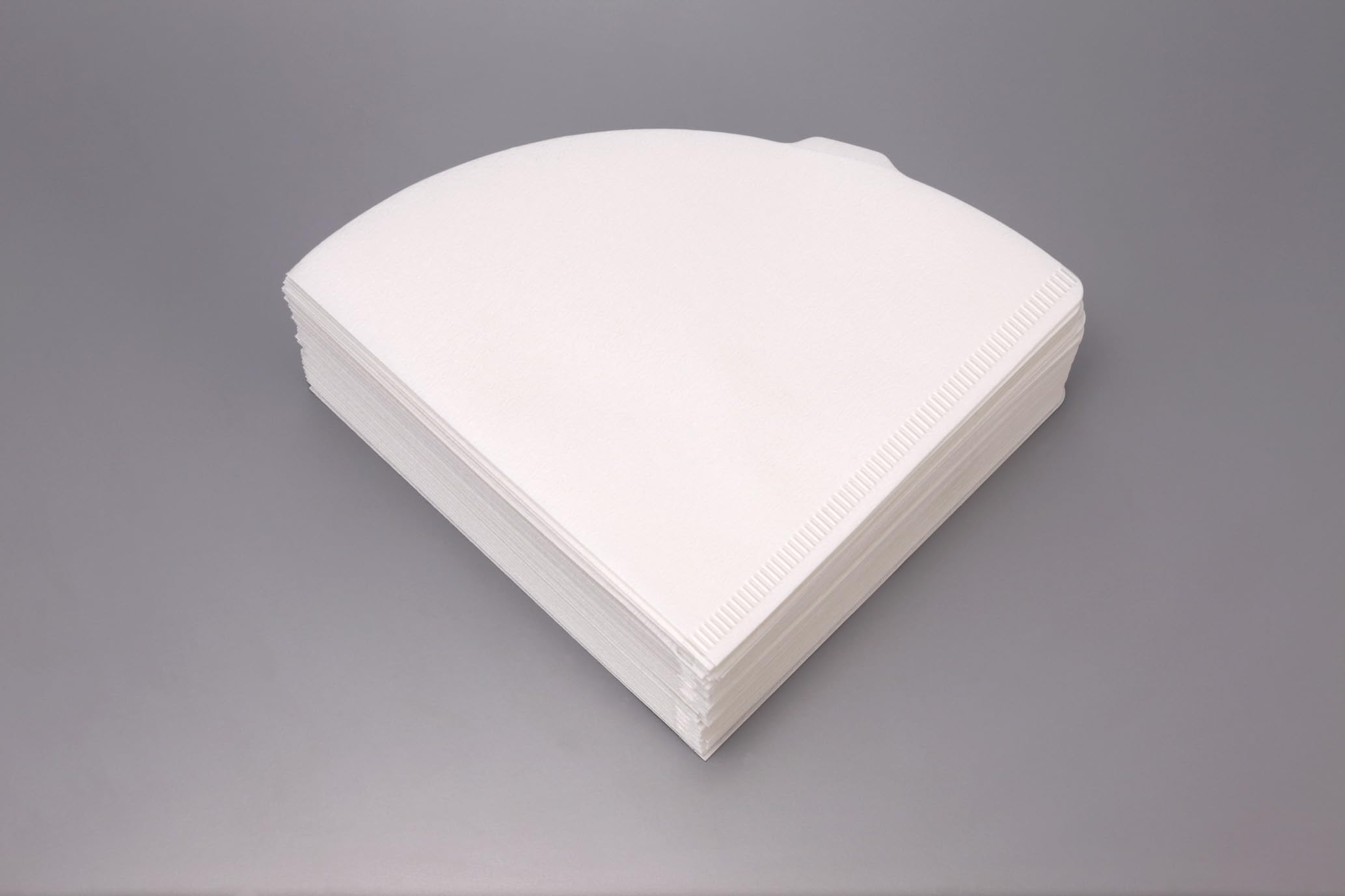 HARIO gros plan texture du filtre montrant fibres et filtration nette