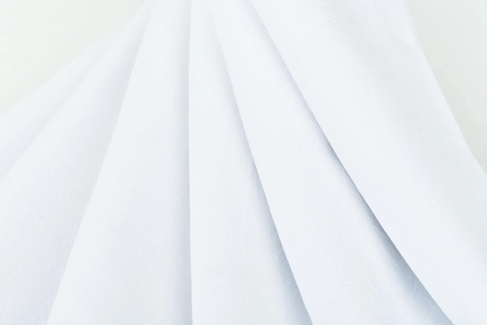 Serviette HAVLULAND pliée dans sac, design léger et facile à emporter