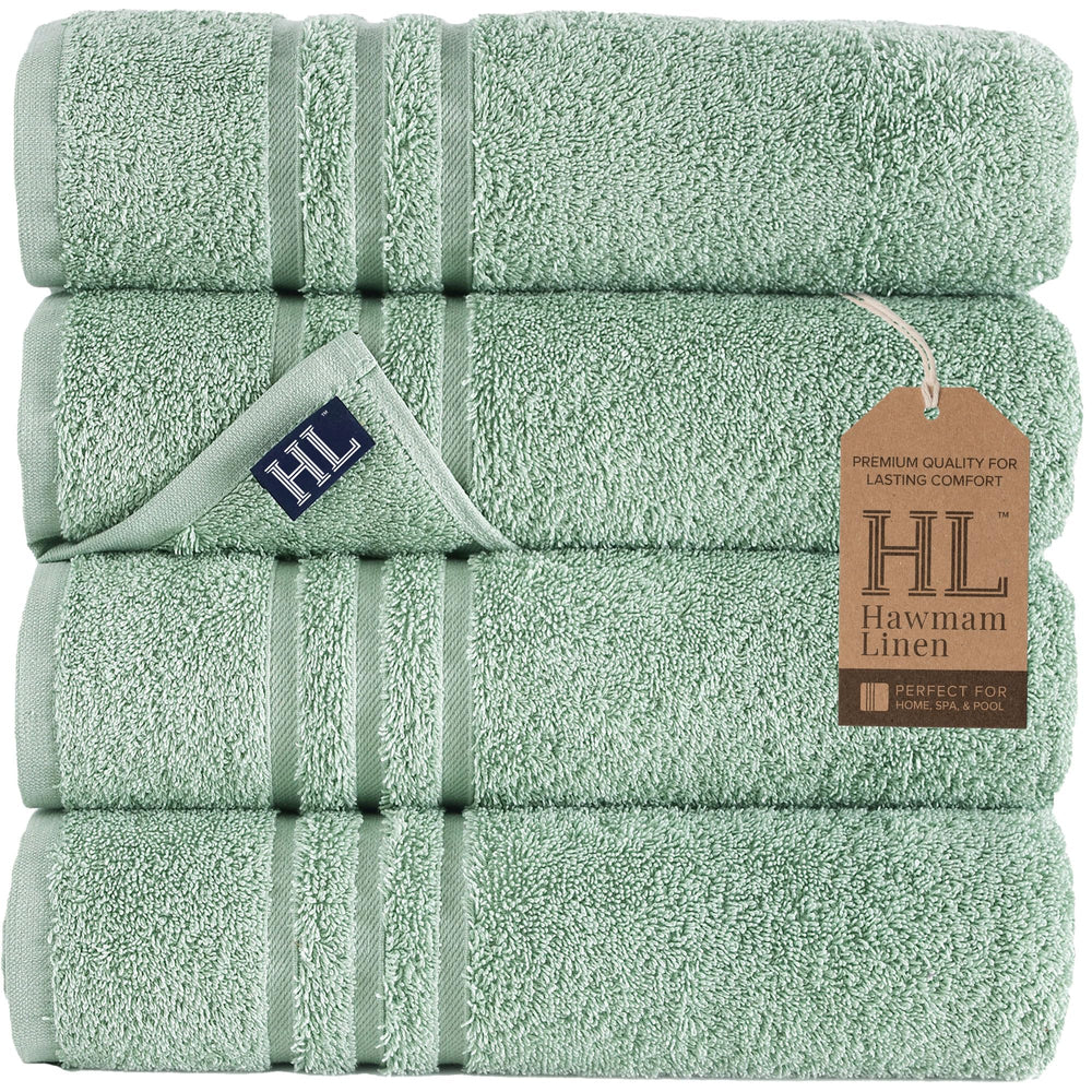 Hawmam Linen serviette pliée vert clair, apparence soignée et absorbance élevée
