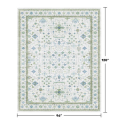 Hazo Haus gros plan sur motif floral Oushak révélant la texture et l'harmonie des couleurs