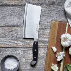 HENCKELS hachoir en action découpant un gros morceau de viande pour efficience