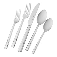 HENCKELS ensemble complet 65 pièces posé sur table, élégance et polyvalence