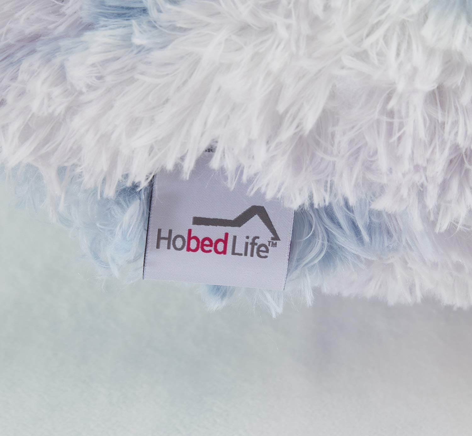 Hobed Life coussin déballé d'un sac vacuum prêt à retrouver son volume
