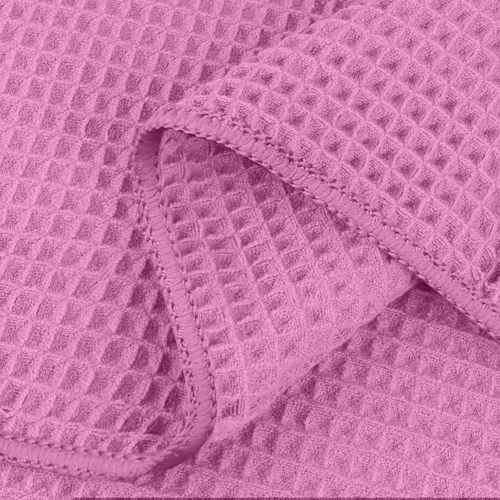 Gros plan sur la texture gaufrée HOMEXCEL montrant absorption et douceur