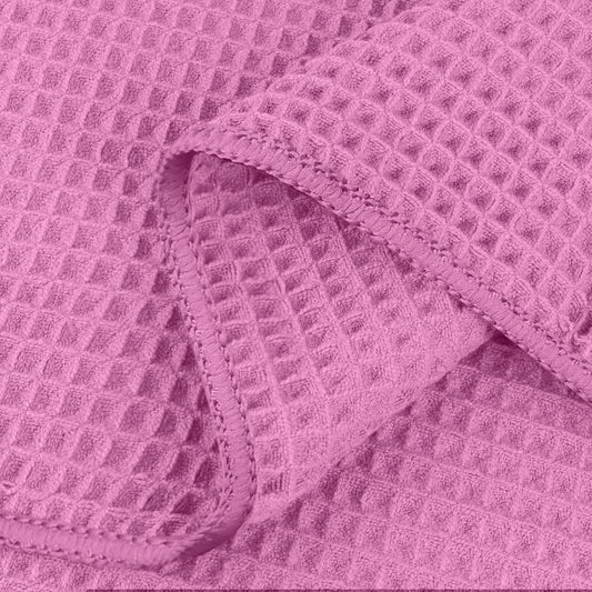 Gros plan sur la texture gaufrée HOMEXCEL montrant absorption et douceur