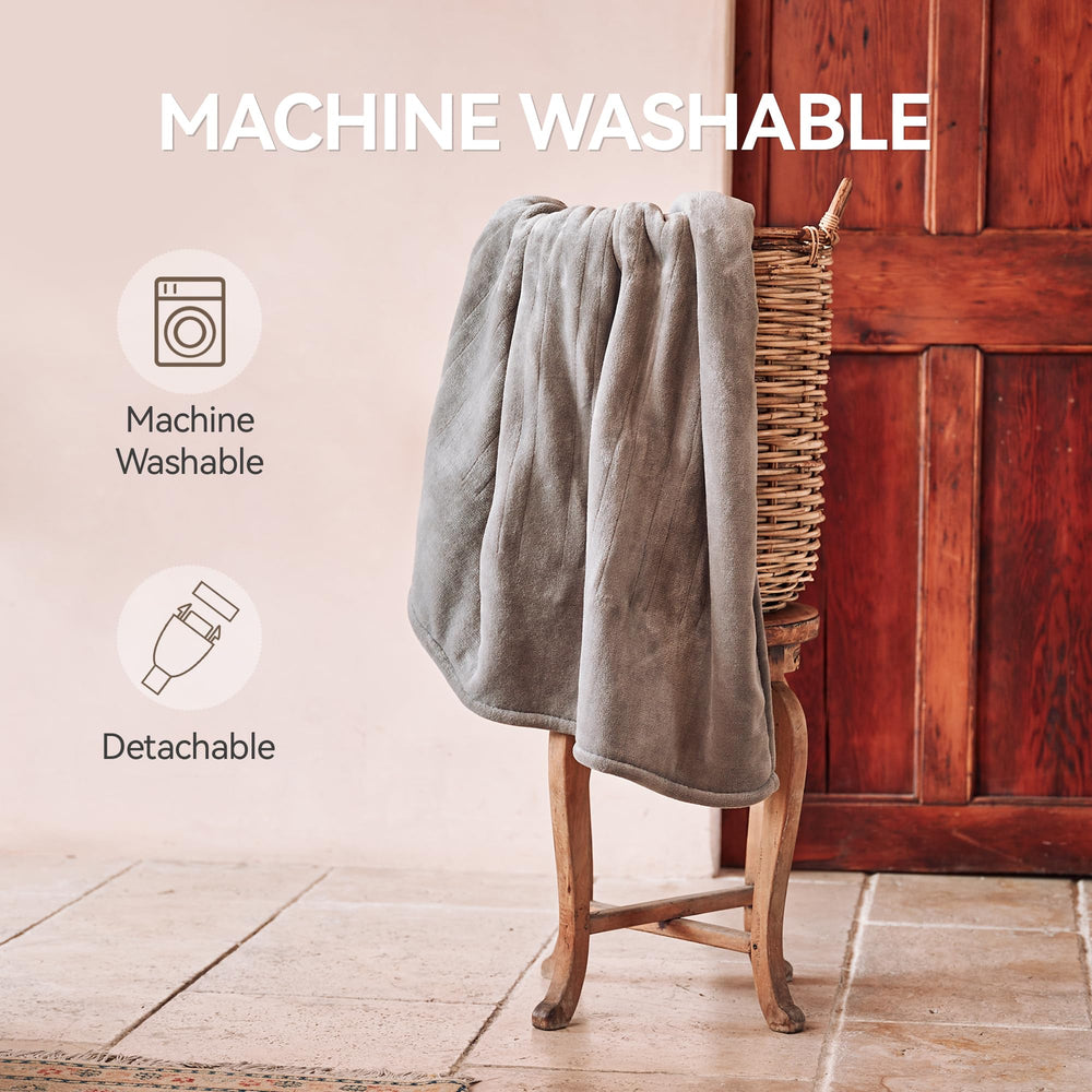 HOMISPRITE couverture en usage sur canapé apportant chaleur réglable et détente