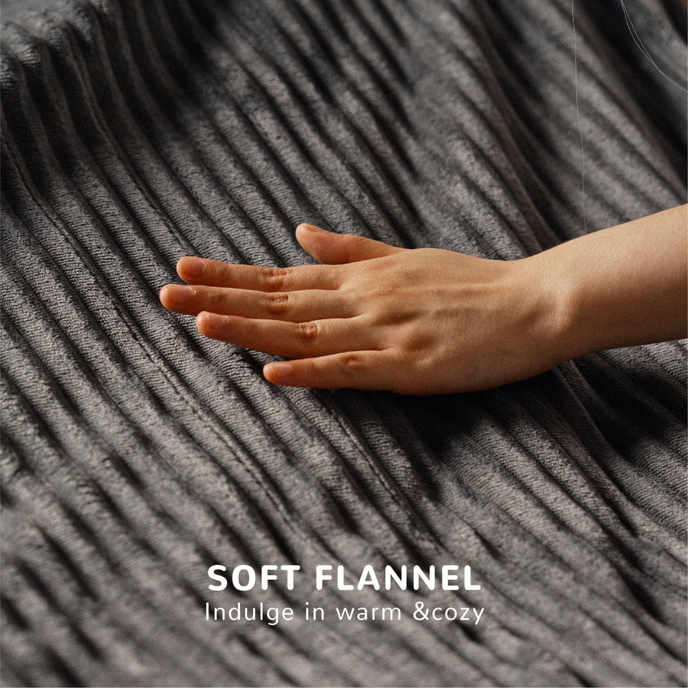 HOMISPRITE plaid en usage sur lit king illustrant confort et couverture complète