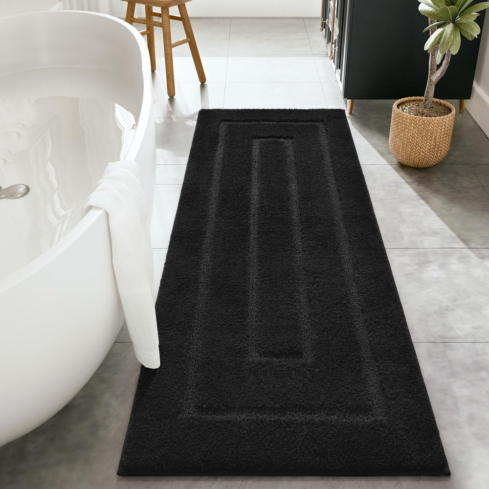 HOMORE tapis de bain face avant noir montrant design élégant et protection du sol