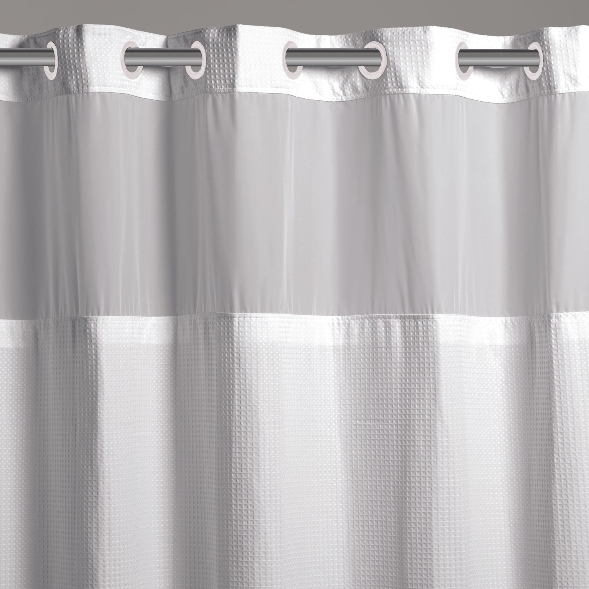 Hookless gros plan microfibre montrant texture et répulsion d'eau durable