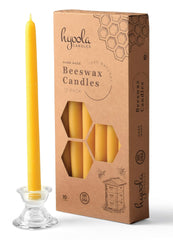 Hyoola bougie allumée sur table créant une lumière accueillante