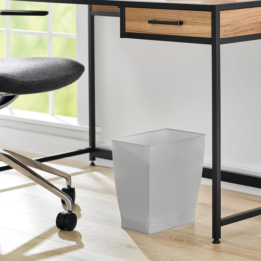 iDesign poubelle à l'échelle d'une main, compacité démontrée
