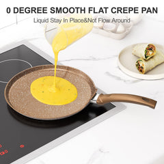 Innerwell poêle en usage avec crêpe en cours de cuisson illustrant le retournement facile