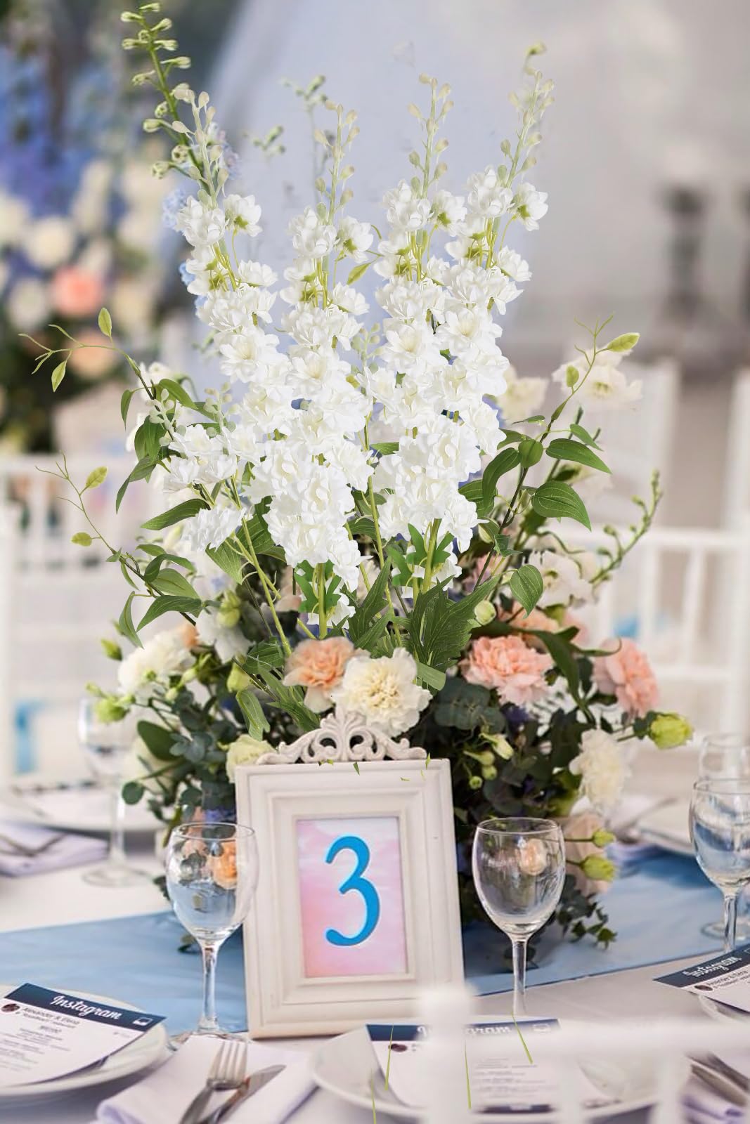 IPOPU décor d'arche de mariage avec delphiniums, installation spectaculaire