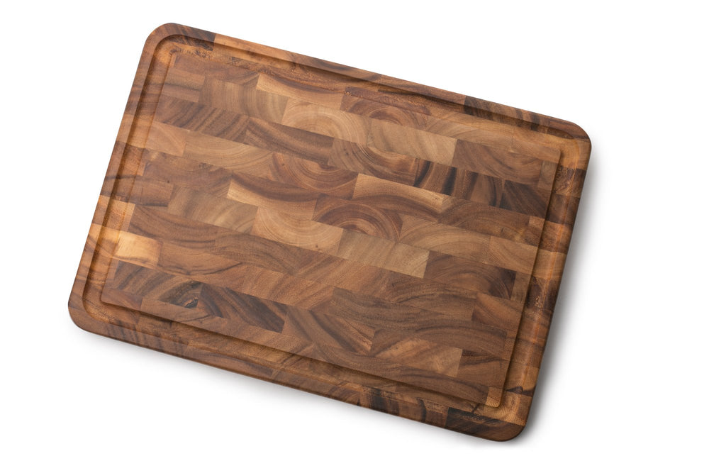 Rigole de la planche Ironwood Gourmet Charleston contenant jus et évitant débordement