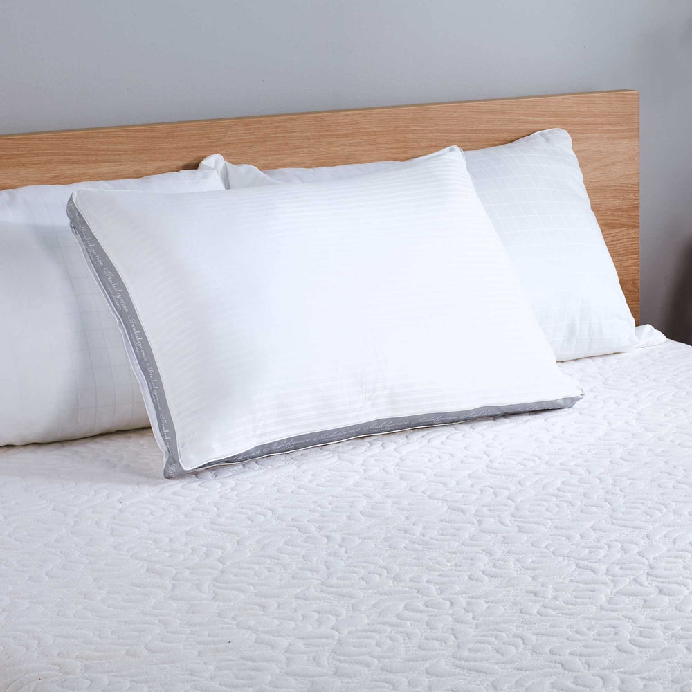 Isotonic oreiller en usage côté dormeur montrant soutien cervical
