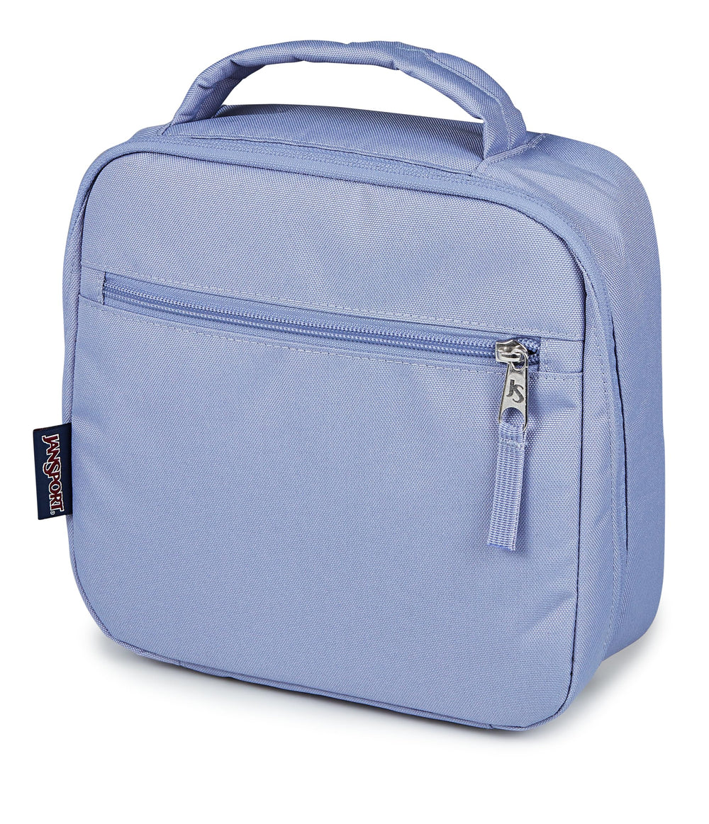 JanSport ouverture à plat montrant la fermeture anglée et le plateau pratique