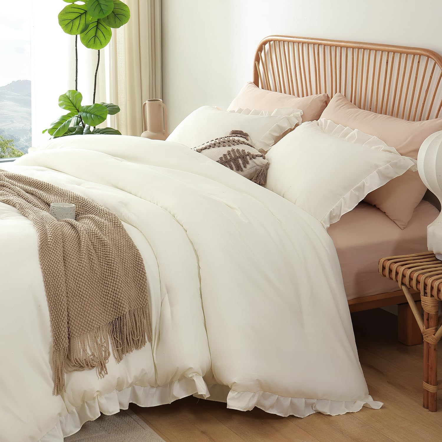 JANZAA couette en usage sur lit, sensation confortable pour toutes saisons
