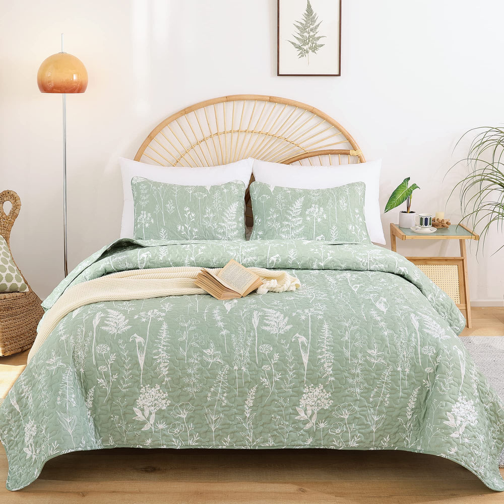 JANZAA quilt posé sur lit, montre l'effet décoratif instantané
