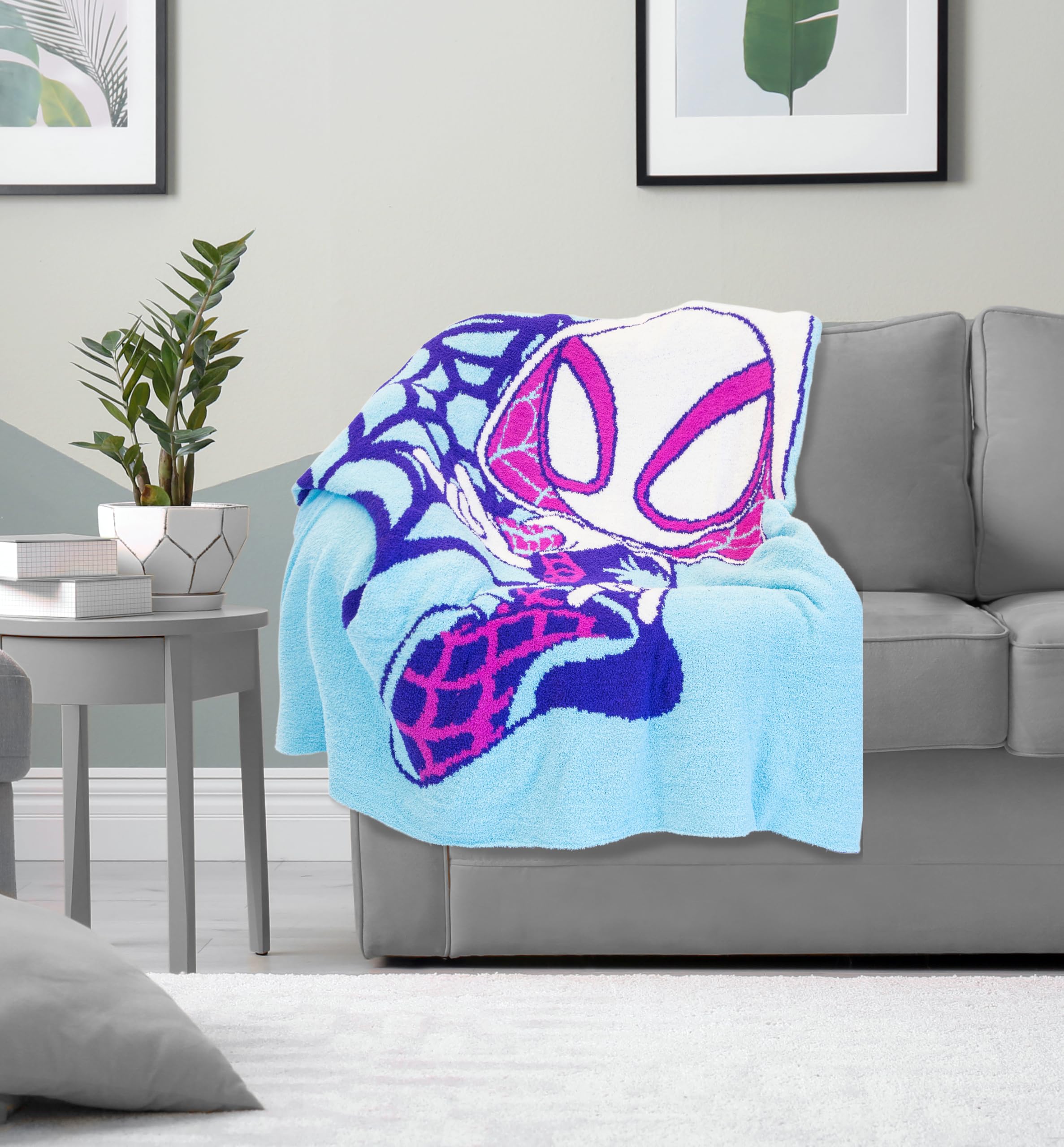 Jay Franco plaid plié montrant taille 50 x 60 pouces pratique